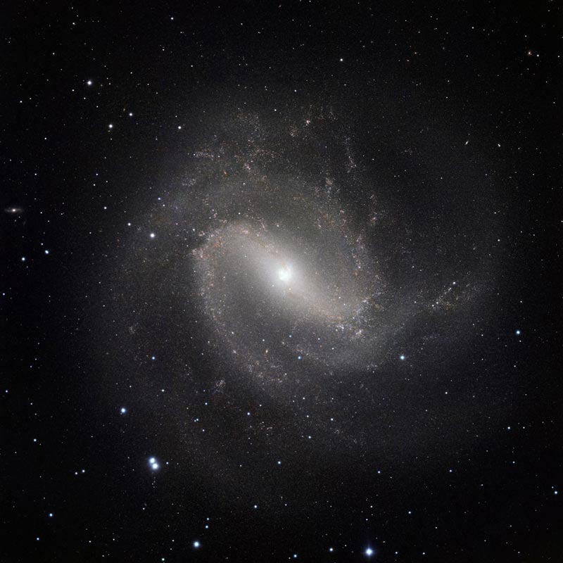 Hot Stars Found Hidden in Galaxy's Dusty Embrace